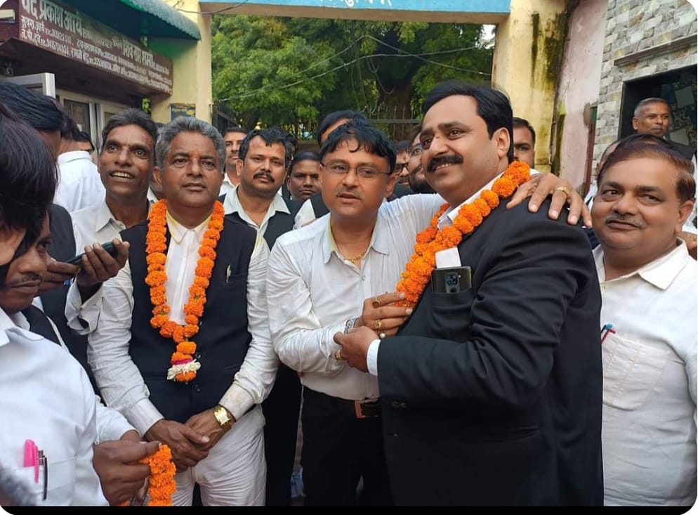 A celebration at the chamber with members of the team.
